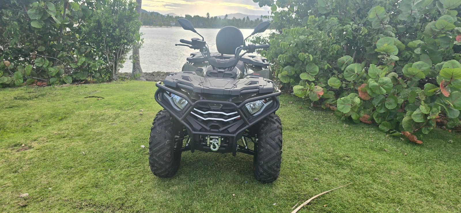 Front view of a green J&R ATV